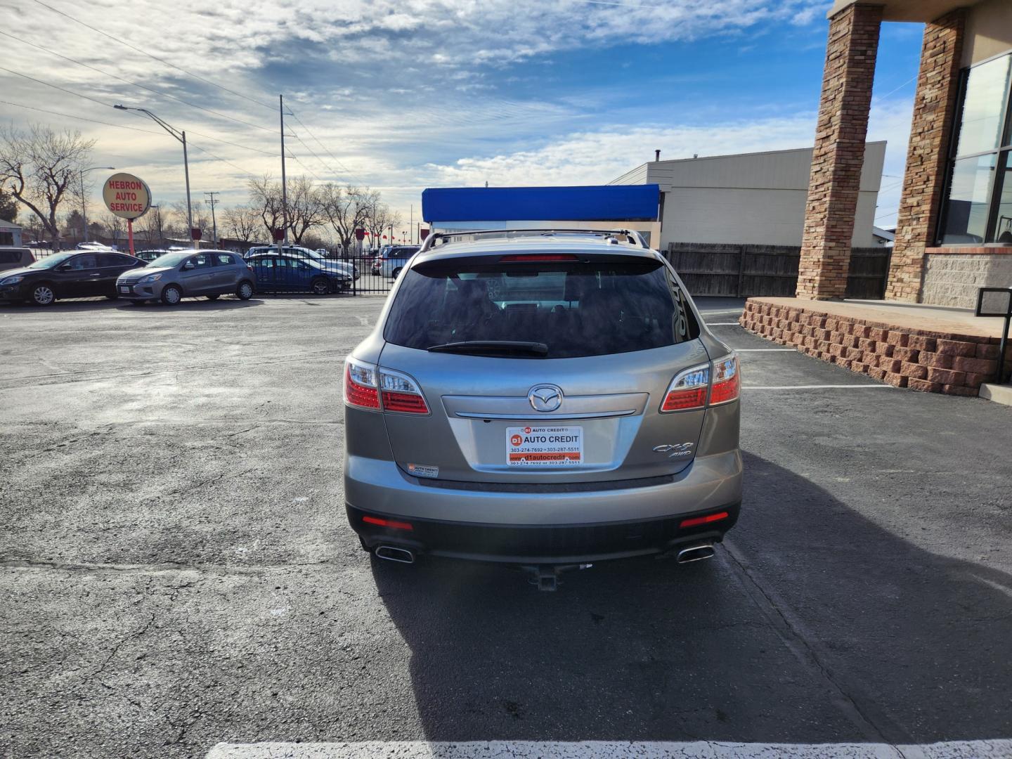 2010 Liquid Silver Metallic /Black Mazda CX-9 Grand Touring (JM3TB3MA6A0) with an 3.7L V6 DOHC 24V engine, Automatic transmission, located at 8595 Washington St., Thornton, CO, 80229, (303) 287-5511, 39.852348, -104.978447 - 2010 Mazda CX-9<br><br>D1 Auto NEVER charges dealer fees! All cars have clean titles and have been inspected for mechanical issues. We have financing for everyone. Good credit, bad credit, first time buyers.<br><br>Please call Lakewood Location 303-274-7692 or Thornton 303-287-5511 to schedule a tes - Photo#6